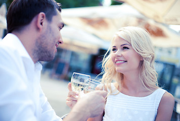 Image showing couple drinking wine in cafe