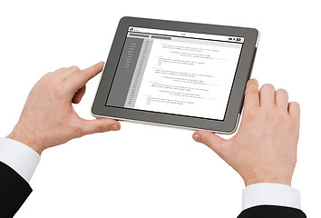 Image showing close up of hands holding tablet pc with coding