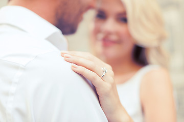 Image showing romantic man proposing to beautiful woman