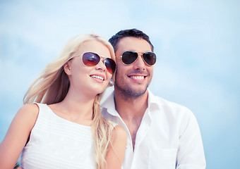 Image showing couple in shades at sea side