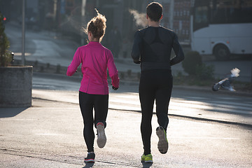 Image showing young  couple jogging