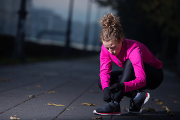 Image showing woman  stretching before morning jogging