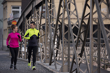 Image showing young  couple jogging