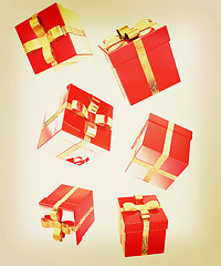 Image showing Bright christmas gifts on a white background . 3D illustration. 