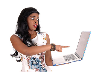 Image showing Woman is shocked from laptop screen.