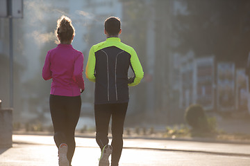 Image showing young  couple jogging