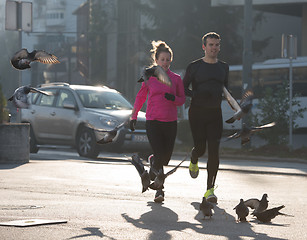 Image showing young  couple jogging