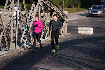 Image showing young  couple jogging