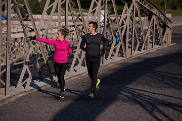 Image showing young  couple jogging