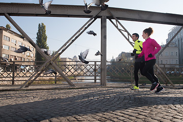 Image showing young  couple jogging