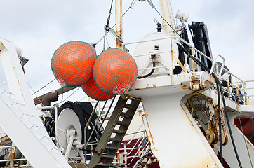 Image showing three big float on big fishingboat