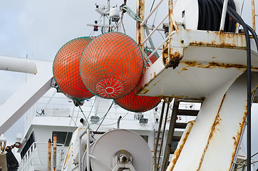 Image showing three big float on big fishingboat 