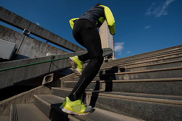 Image showing man jogging on steps