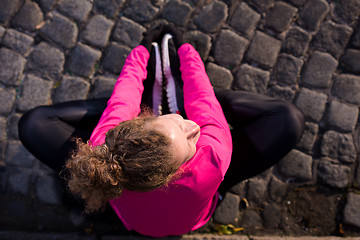 Image showing woman  stretching before morning jogging