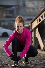 Image showing woman  stretching before morning jogging