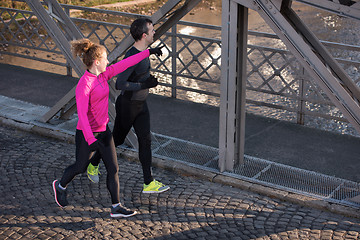 Image showing young  couple jogging