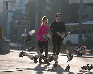 Image showing young  couple jogging