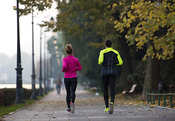 Image showing young  couple jogging