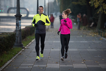 Image showing young  couple jogging