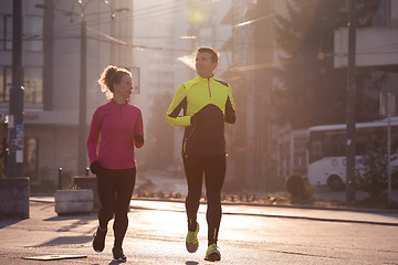 Image showing young  couple jogging