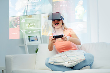 Image showing woman in virtual reality headset with controller