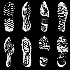 Image showing Collection  imprint soles shoes  black  silhouette. illustration