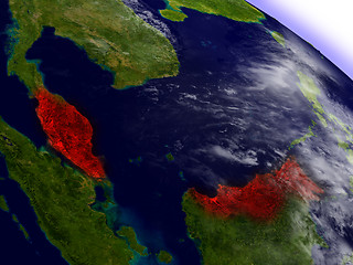 Image showing Malaysia from space highlighted in red