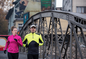 Image showing young  couple jogging