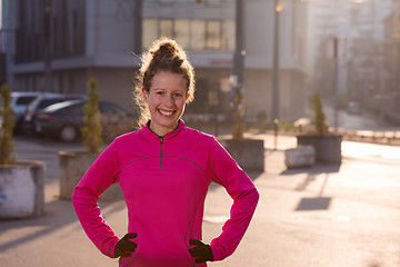 Image showing woman  stretching before morning jogging