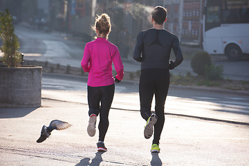 Image showing young  couple jogging