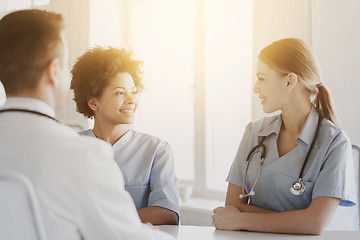 Image showing group of happy doctors meeting at hospital office