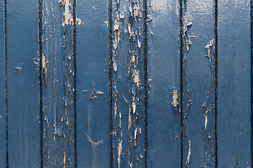 Image showing close up of old wooden boards painted in blue