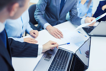 Image showing close up of files and laptop computer in office