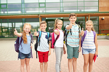 Image showing happy elementary school students showing thumbs up