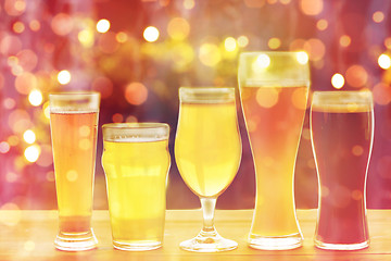 Image showing close up of different beers in glasses on table