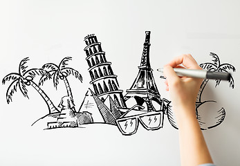 Image showing close up of hand drawing touristic landmarks