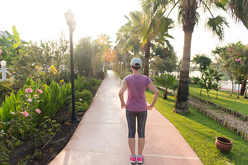 Image showing woman  stretching before morning jogging