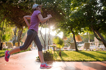 Image showing sporty woman jogging