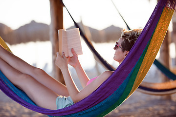 Image showing relaxed woman laying in hammock