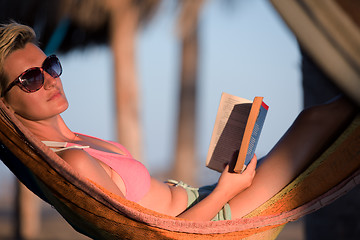 Image showing relaxed woman laying in hammock