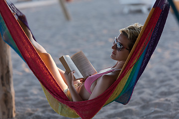 Image showing relaxed woman laying in hammock