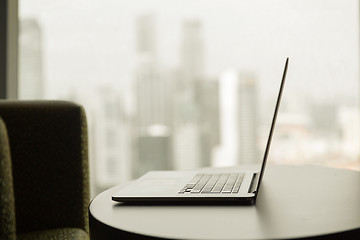 Image showing close up of laptop computer on table at office