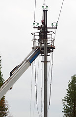 Image showing Electrician working at a pillar