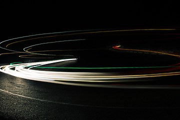 Image showing Bright car lines on night road