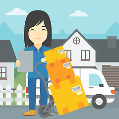 Image showing Delivery woman with cardboard boxes.