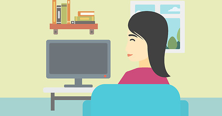 Image showing Woman watching TV.