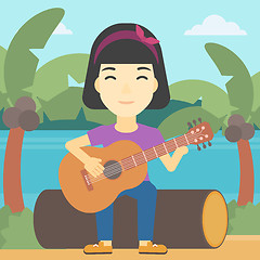 Image showing Musician playing acoustic guitar.