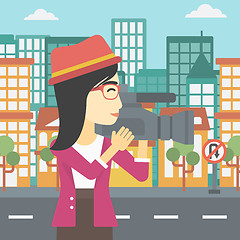 Image showing Camerawoman with video camera vector illustration.