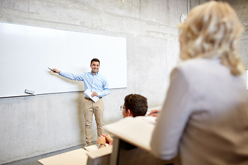 Image showing group of students and teacher at lecture