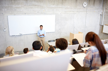 Image showing group of students and teacher at lecture